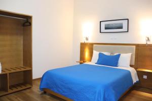 Un ou plusieurs lits dans un hébergement de l'établissement Hotel Belém Tejo - Setubalense
