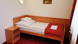 Postel nebo postele na pokoji v ubytování Diana Club Hotel