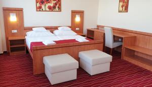 Postel nebo postele na pokoji v ubytování Diana Club Hotel
