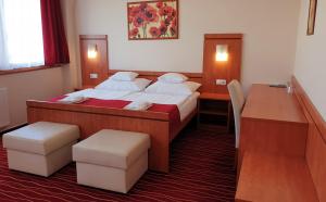 Postel nebo postele na pokoji v ubytování Diana Club Hotel