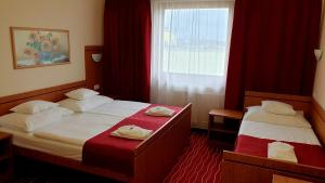 Postel nebo postele na pokoji v ubytování Diana Club Hotel