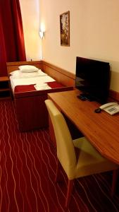TV a/nebo společenská místnost v ubytování Diana Club Hotel