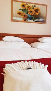 Postel nebo postele na pokoji v ubytování Diana Club Hotel