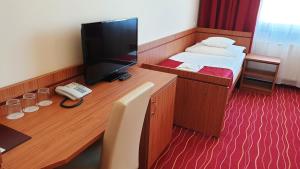 TV a/nebo společenská místnost v ubytování Diana Club Hotel