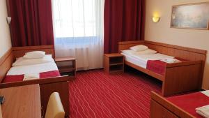 Postel nebo postele na pokoji v ubytování Diana Club Hotel