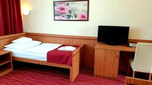 TV a/nebo společenská místnost v ubytování Diana Club Hotel