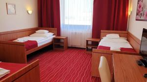 Postel nebo postele na pokoji v ubytování Diana Club Hotel