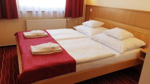 Postel nebo postele na pokoji v ubytování Diana Club Hotel