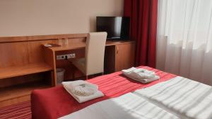 Postel nebo postele na pokoji v ubytování Diana Club Hotel