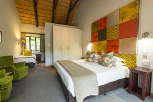 Ein Bett oder Betten in einem Zimmer der Unterkunft Cavern Resort & Spa