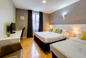 Katil atau katil-katil dalam bilik di Hotel Villa Milas