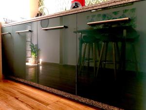 Kuchyň nebo kuchyňský kout v ubytování Apartamentos Puerta Real Sevilla