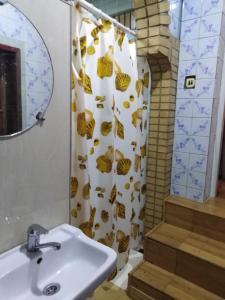 Een badkamer bij Al Amin Guest House