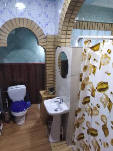 Ένα μπάνιο στο Al Amin Guest House