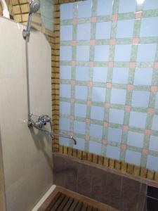 Een badkamer bij Al Amin Guest House