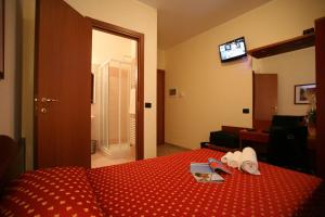 Voodi või voodid majutusasutuse Hotel Della Volta toas