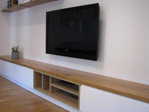 Televízia a/alebo spoločenská miestnosť v ubytovaní Stylowy 2-pokojowy apartament 5 min. od Rynku