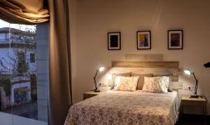 Posteľ alebo postele v izbe v ubytovaní Urban House Siurot 33