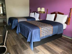 Cama o camas de una habitación en Rogers Inn