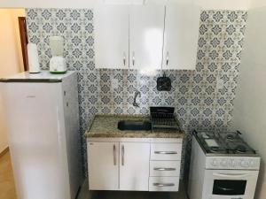 Kuchyň nebo kuchyňský kout v ubytování Apartamento 02 no Vivendas do Serrano em Lençóis