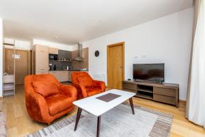 TV/Unterhaltungsangebot in der Unterkunft Apartments LORA in Apart-hotel