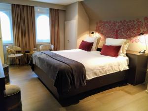 Postel nebo postele na pokoji v ubytování Hotel Lepelbed