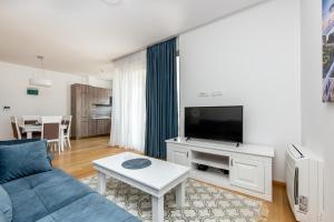 TV/Unterhaltungsangebot in der Unterkunft Apartments LORA in Apart-hotel