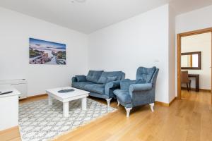 Ein Sitzbereich in der Unterkunft Apartments LORA in Apart-hotel