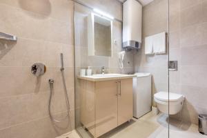 Ein Badezimmer in der Unterkunft Apartments LORA in Apart-hotel
