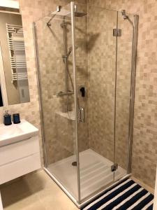 Kúpeľňa v ubytovaní Apartament Nadmorski Kołobrzeg II
