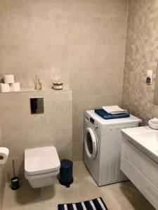 Kúpeľňa v ubytovaní Apartament Nadmorski Kołobrzeg II