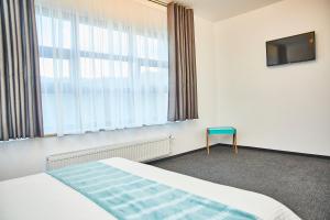 Postel nebo postele na pokoji v ubytování TURQUOISE HOUSE + 37 fotografií