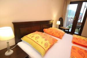 Ένα ή περισσότερα κρεβάτια σε δωμάτιο στο Vila Golful Dunării