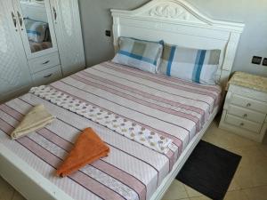 Postel nebo postele na pokoji v ubytování Full Appart Hôtel