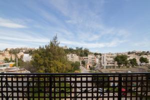 a view of a city from a balcony at Athens Airport Loft in Spata