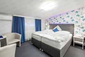 Postel nebo postele na pokoji v ubytování Villa May Way