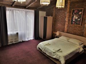 Postel nebo postele na pokoji v ubytování Casa Catalea