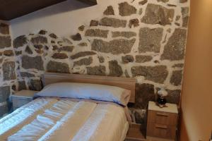 Katil atau katil-katil dalam bilik di Casa en La Rinconada