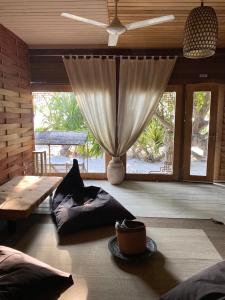 Istumisnurk majutusasutuses Samura Maldives Guest House Thulusdhoo