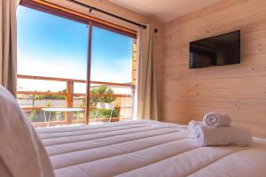 TV a/nebo společenská místnost v ubytování Hostel Moreno