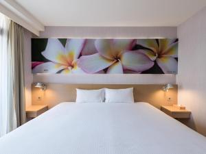 Katil atau katil-katil dalam bilik di Mellow Fields Hotel