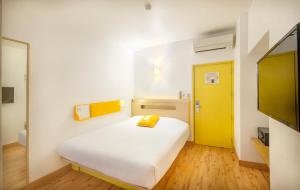 Letto o letti in una camera di bloomrooms @ Janpath