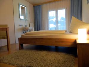 Postel nebo postele na pokoji v ubytování Haus Matt