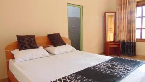 Katil atau katil-katil dalam bilik di Hotel Alas Garden
