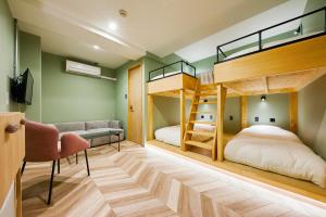 Postel nebo postele na pokoji v ubytování mizuka Daimyo 7 - unmanned hotel -