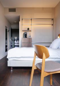 Ένα ή περισσότερα κρεβάτια σε δωμάτιο στο Sorell Hotel Zürichberg