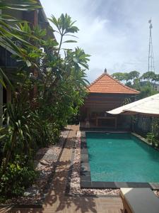 Πισίνα στο ή κοντά στο D'puja Home Stay and Spa