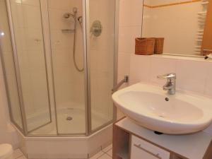 a bathroom with a shower and a sink at Villa Seegarten in Boltenhagen +27 photos