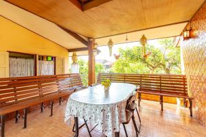 Balkón nebo terasa v ubytování Baan Maihorm Guesthouse