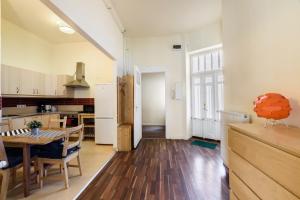 Kuchyň nebo kuchyňský kout v ubytování Arpa Flat Sunny